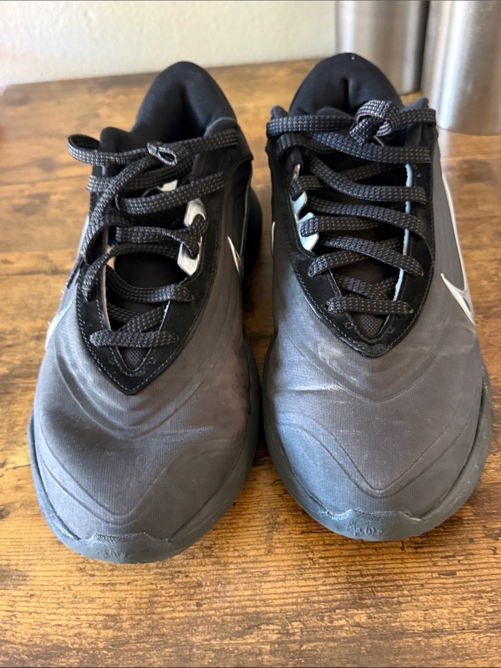 Nike Men's Black Athletic Running Shoes with Subtle Silver Swoosh
